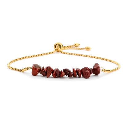 Gold Bracelet with Red Stones